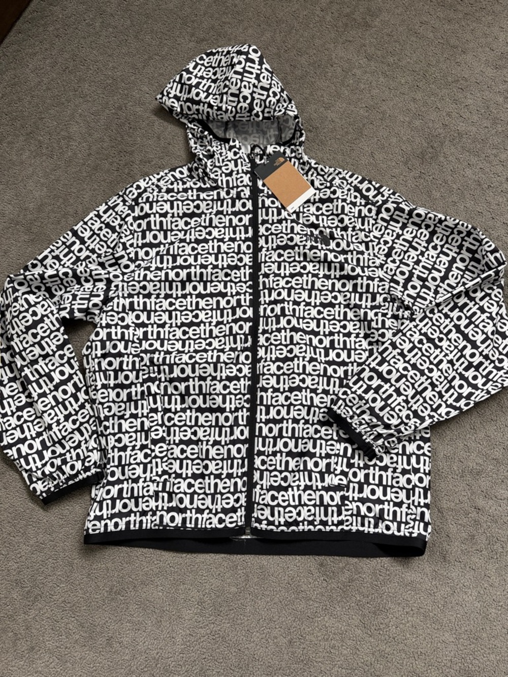 The North Face Black & White Logo Print Hooded Rain Jacket
